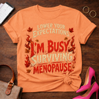 T-Shirt — "Lower Your Expectations. I'm Busy Surviving Menopause" Vintage Quote Tee