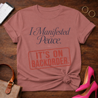 I Manifested Peace Tee — "It's On Backorder" Funny Shirt