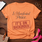 I Manifested Peace Tee — "It's On Backorder" Funny Shirt