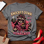Knocked Down But Never Out of Snacks T-Shirt - Cute Raccoon Snack Lover Tee